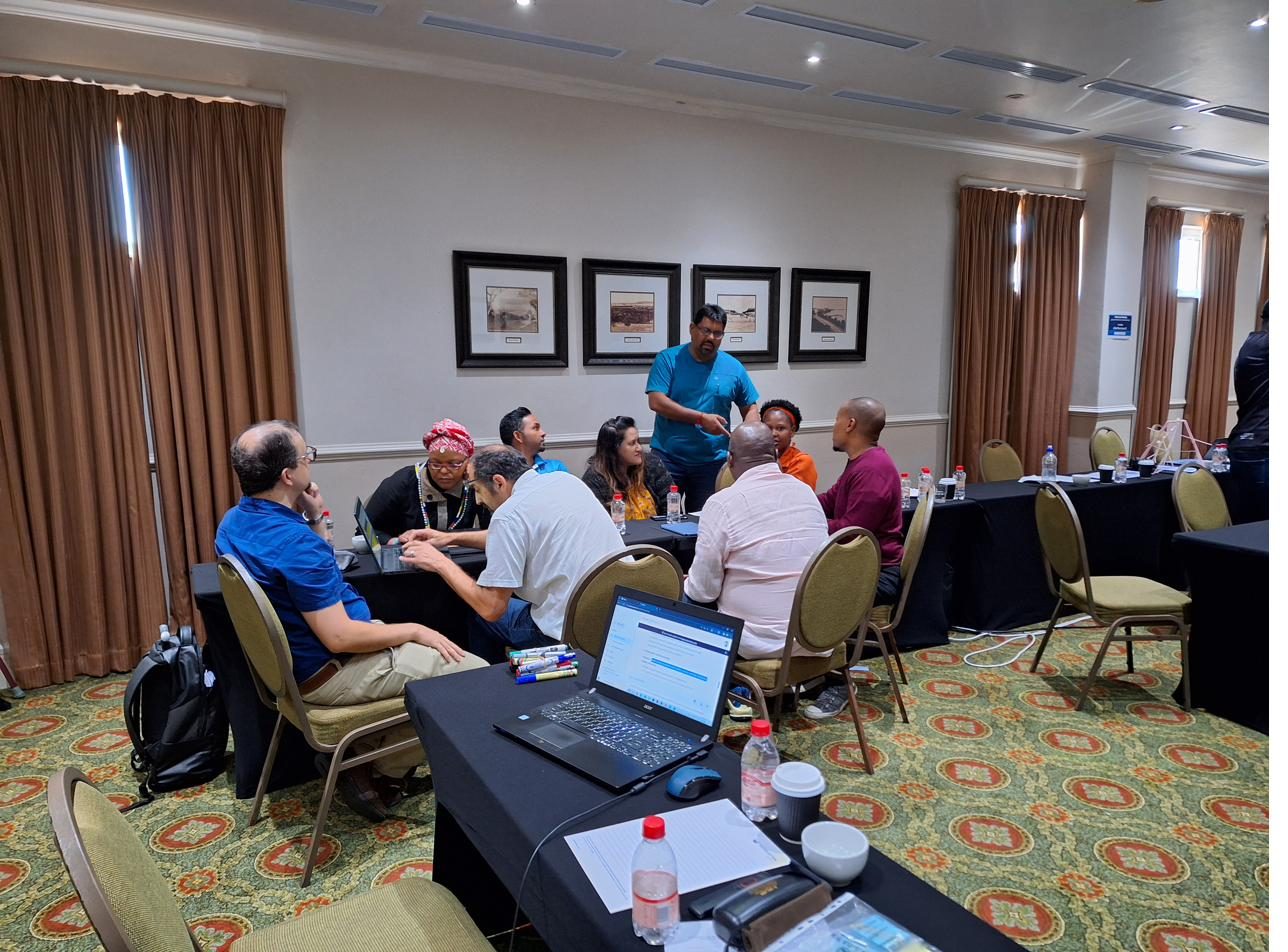 Anil Salick facilitating a strategic planning session with a diverse leadership team